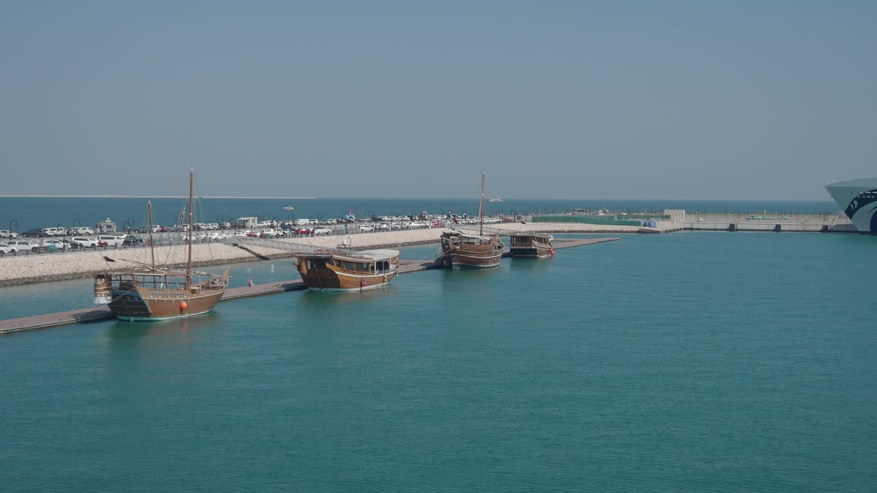 Boats docked at a marina