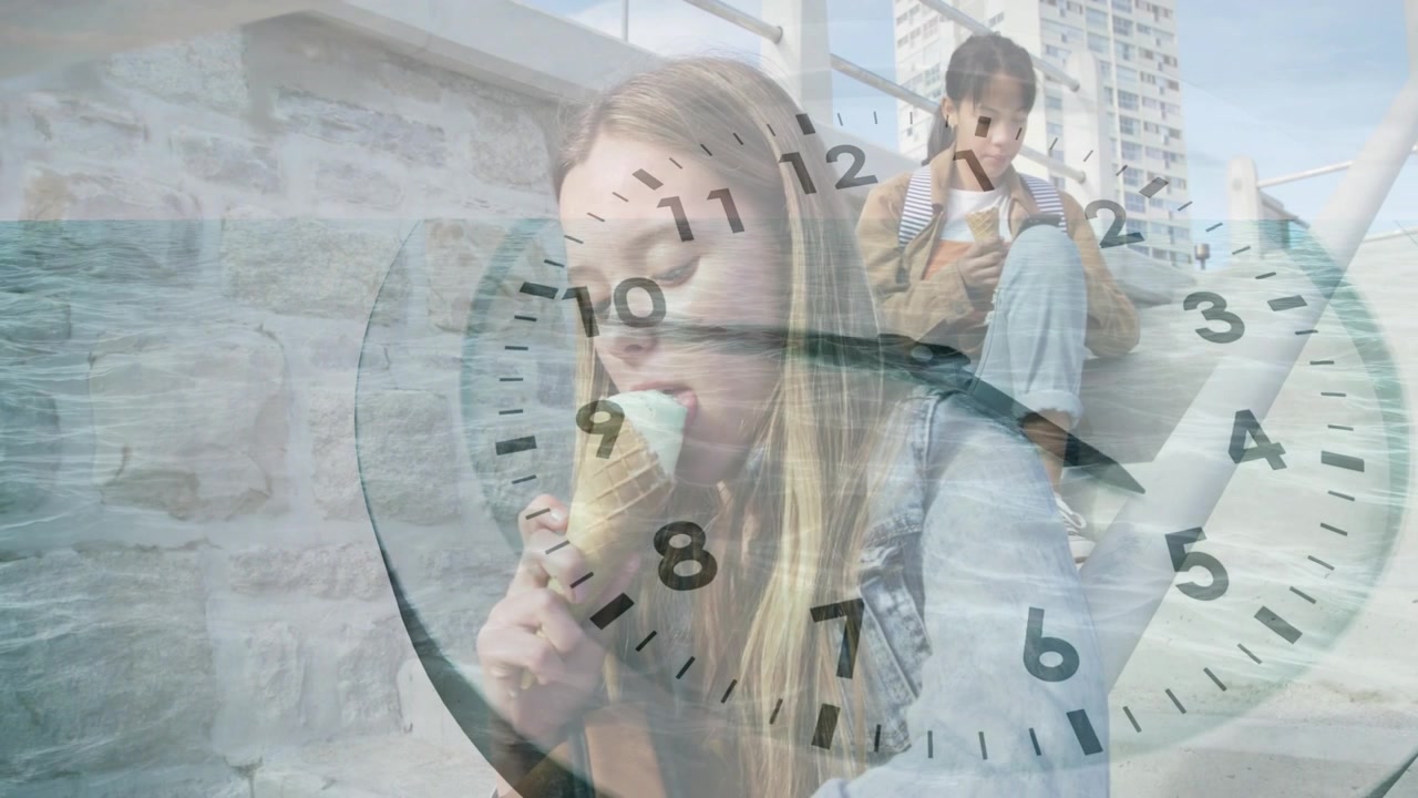 Two teen girls sitting on steps, warm sun urging girl eating cone, clock overlay advancing, leisure