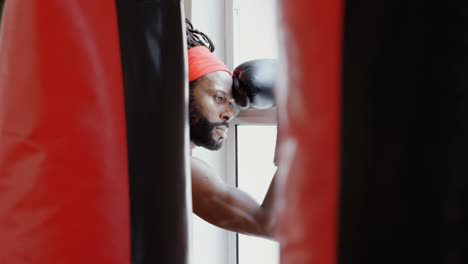 male boxer standing in fitness studio 4k