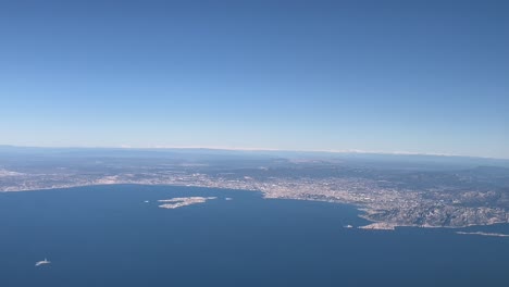 aerial view of marseilles city, france, shot from an airplane cabin during the approach to the airport