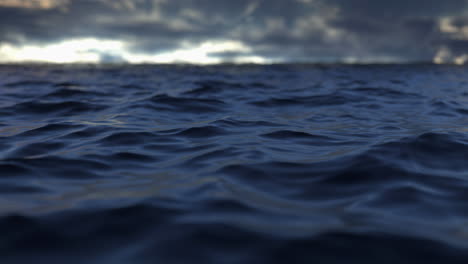 view of the dark ocean surface. sea and sky landscape, defocused effect and stormy clouds as a background