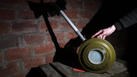 View of a modified anti-tank TM-62 mine designed to be dropped by a drone in Ukraine.