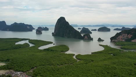 4k drone video flying towards samet nangshe viewpoint near phang nga bay in thailand