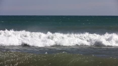 Surfer-falling-in-El-Saler-beach,-Spain