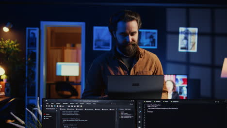 Portrait-of-smiling-man-doing-IT-support-job-from-home,-standing-in-office