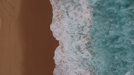 Top-Down-View-Of-Waves-And-Coastline