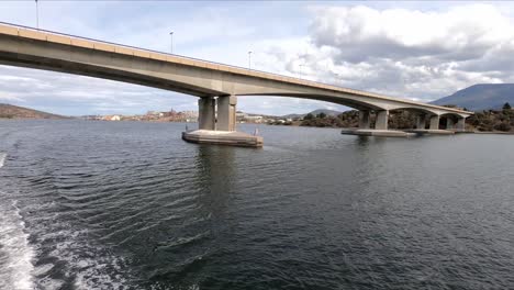 beneath the bowen bridge on the derwent river heading to the mona museum