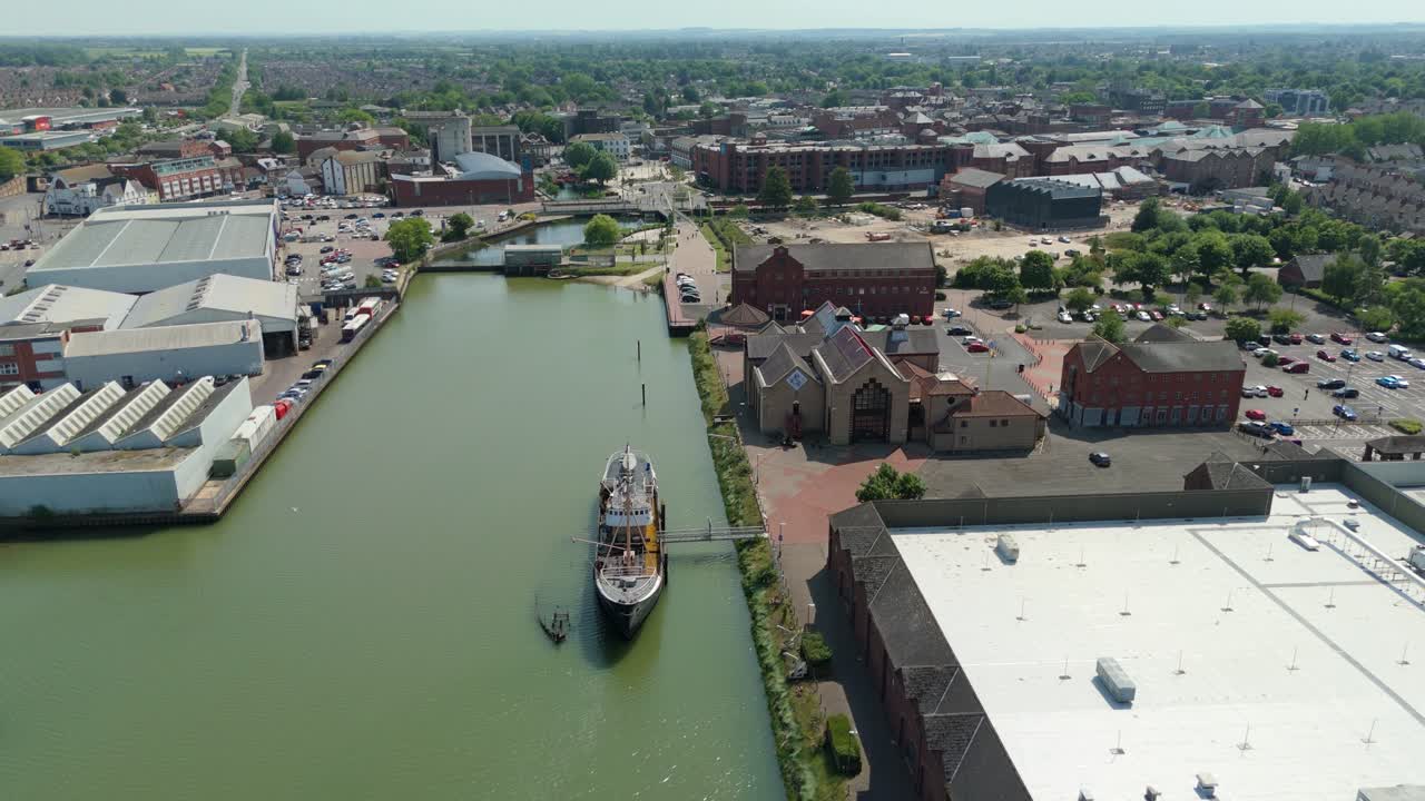 Industrial port activity at Grimsby harbour seen from drone featuring Chamber of Commerce in England