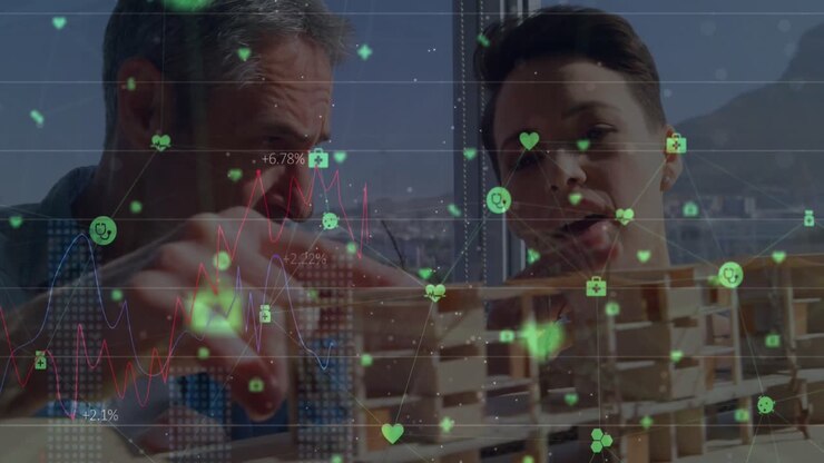 Animation of network of digital icons over diverse male and female engineers discussing over a model