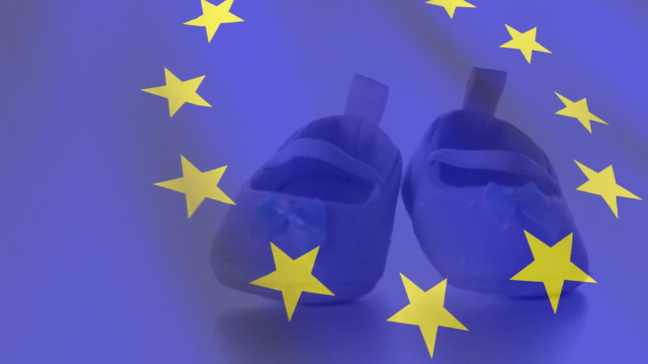 Animazione della bandiera dell'UE sopra scarpe da bambino.