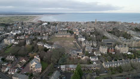 aerial push in on town of st andrews, scotland