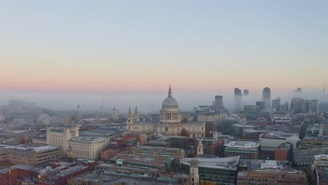 establishing dolly forward drone shot of st pauls cathedral london foggy sunrise