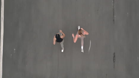 two women running on a street