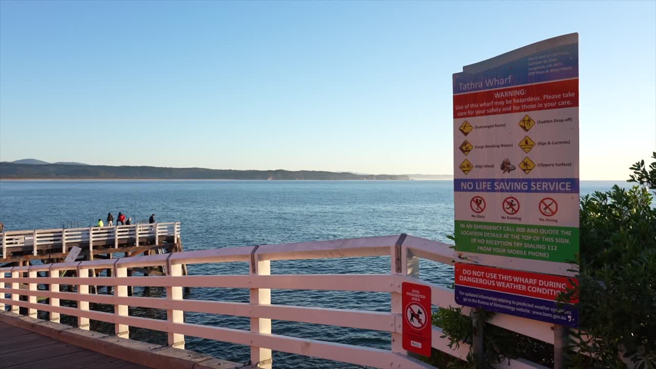 Tathra wharf, public warning signage, New South Wales, Australia