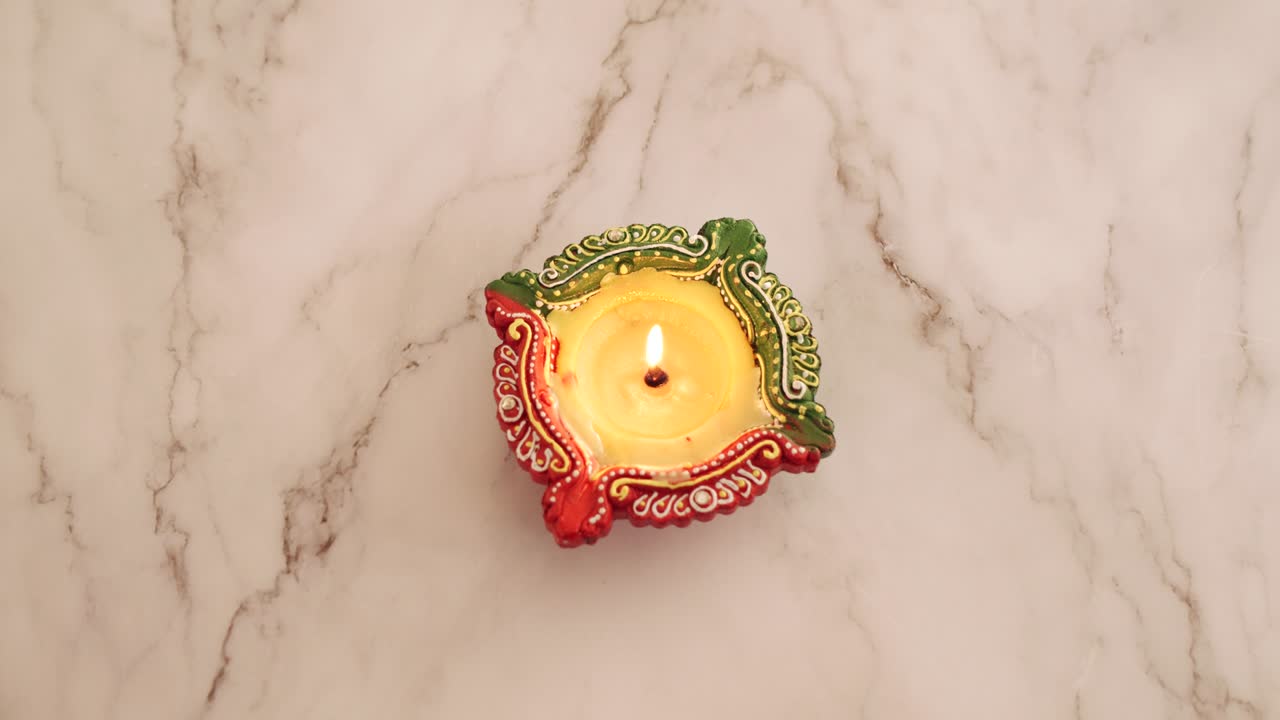 Diwali diyas being lit in 2020 in day time along with surgical masks
