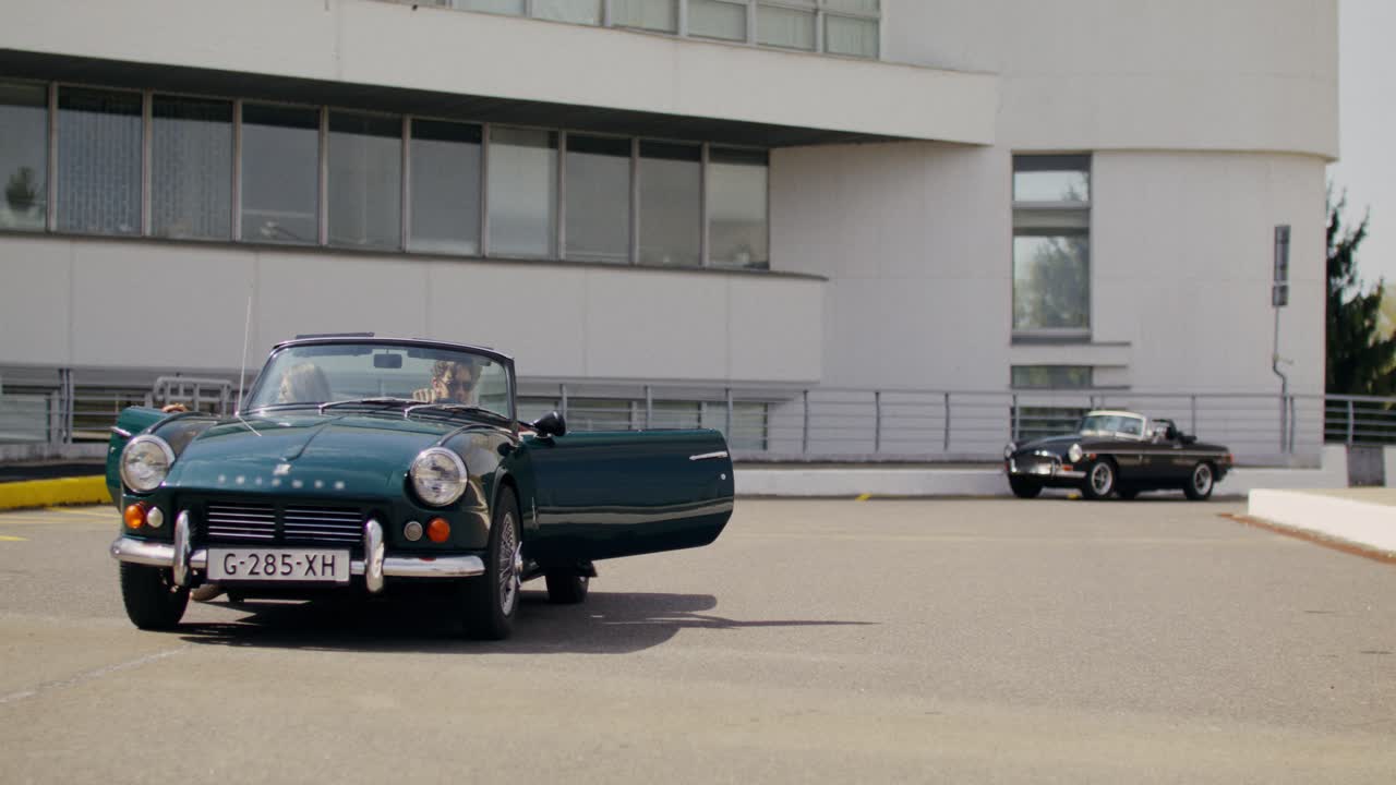 Couple in Vintage Convertible Car