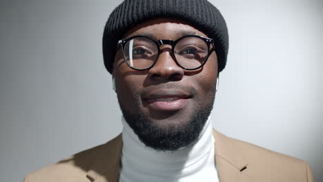 portrait of cheerful afro-american hipster
