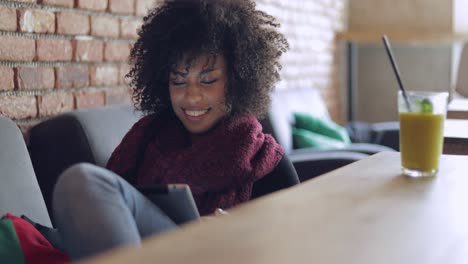 adorable woman using table in cafe