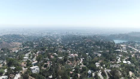 medium altitude forward moving aerial over hollywood hill