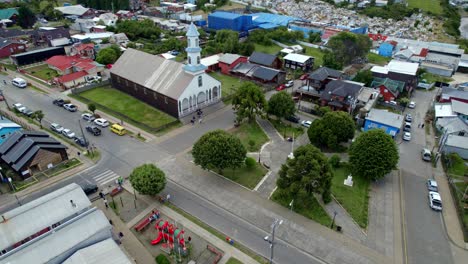 Chiloe-Aerial-Urban-Landscape,-Drone-Above-Dalcahue-Church-Historic-Chilean-City