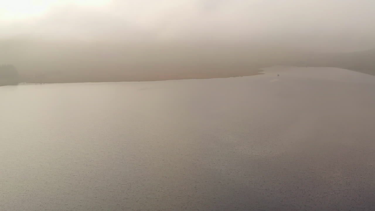 Spelga dam on a misty morning