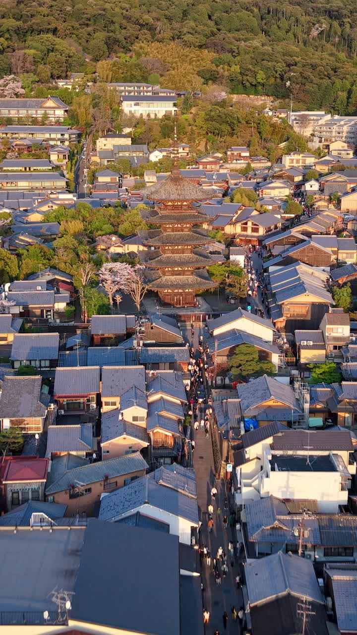 Aerial drone view of the Yasaka Pagoda temple in daylight in Kyoto, Japan