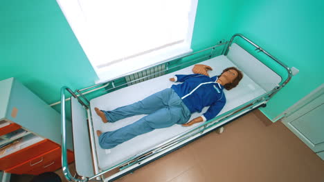 medical equipments for education. medical dummy lying on hospital bed