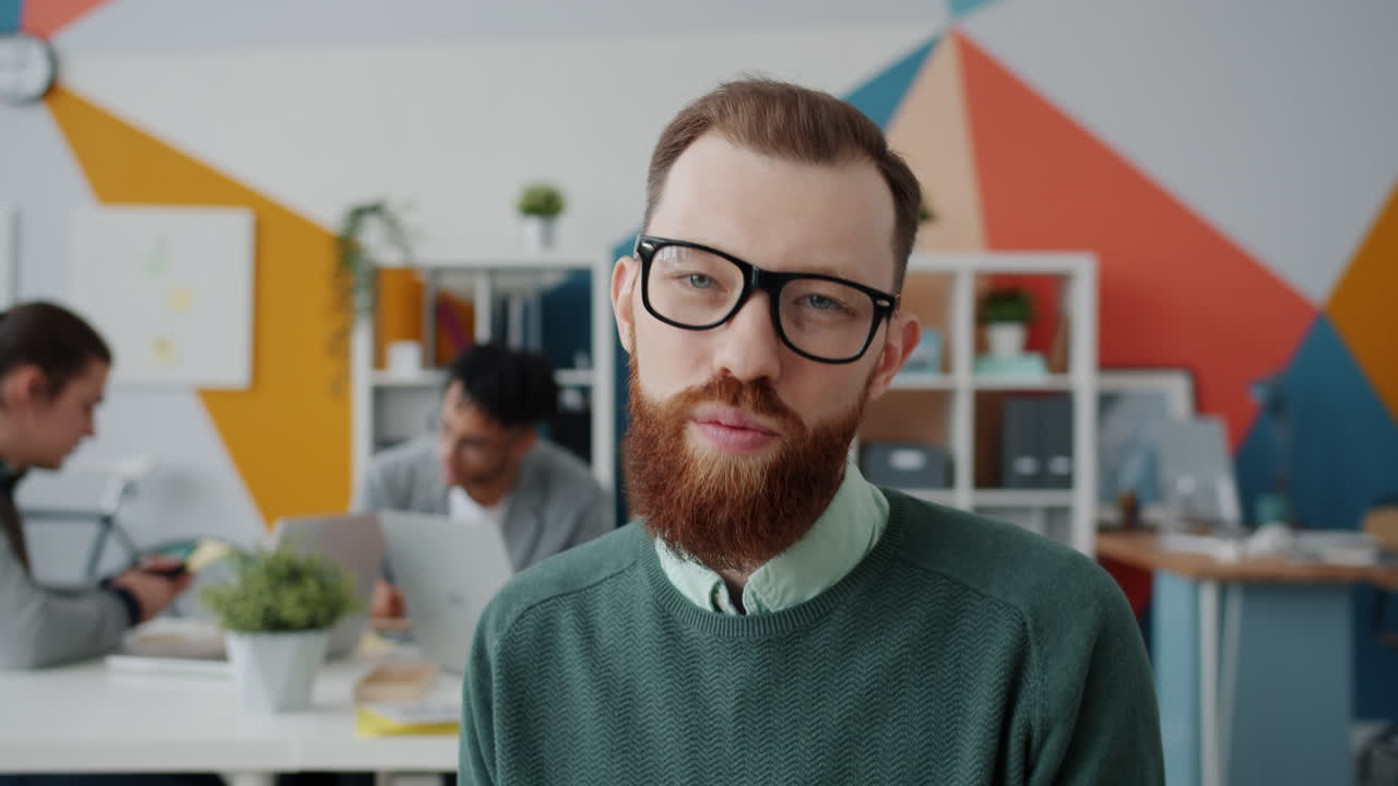 Businessman Giving a Presentation in Office Setting