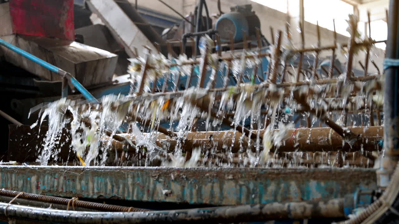 Special rotating machines on a waste recycling factory working with plastic garbage