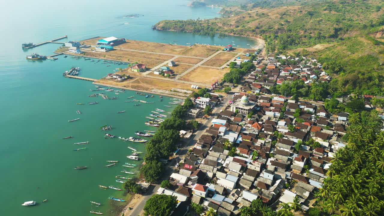 Aerial over the fishing harbour and town of Awang Mertak on Lombok island, Indonesia