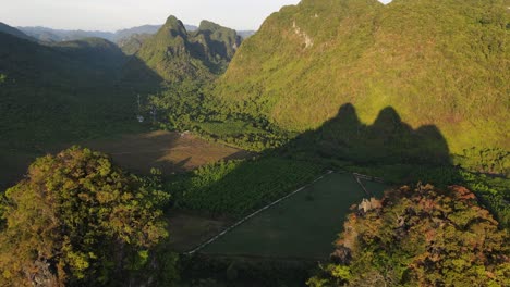 drone moves backward between two mountains