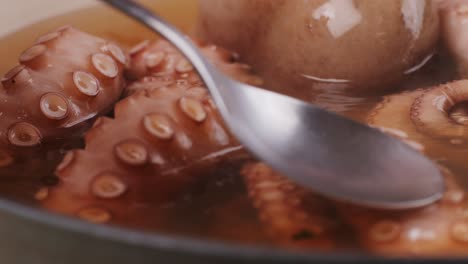 cooking octopus in a pot