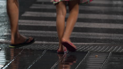 pedestrian crossing under the rain