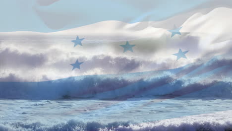 digital composition of waving honduras flag against waves in the sea