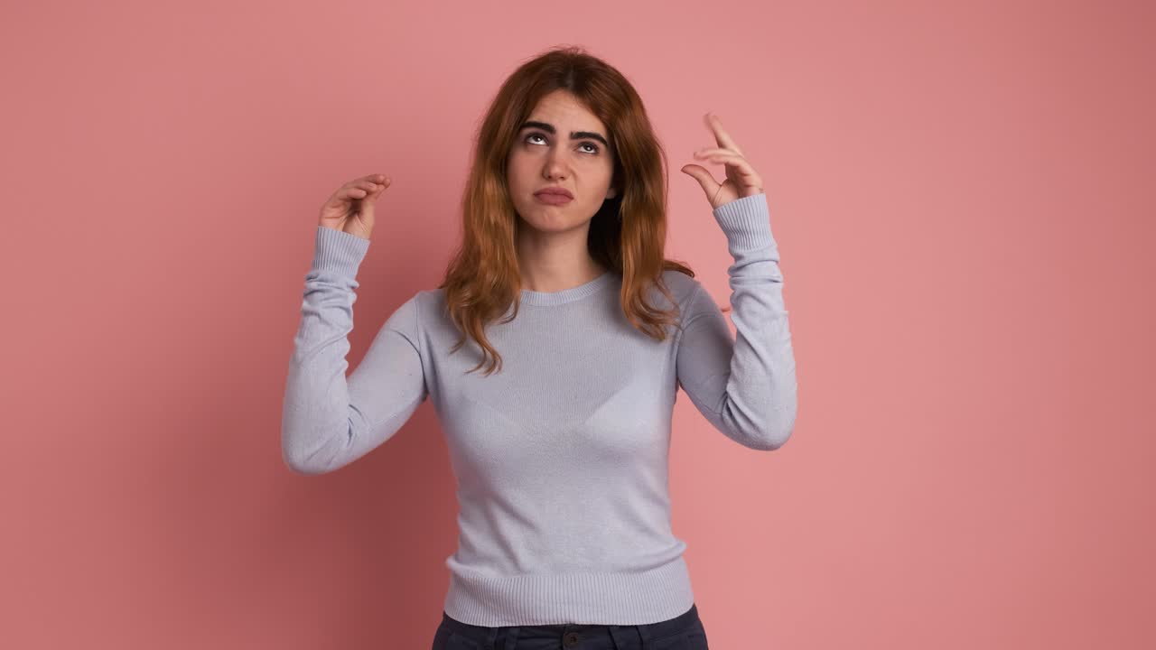 Young woman complain about gossip gesturing with hands