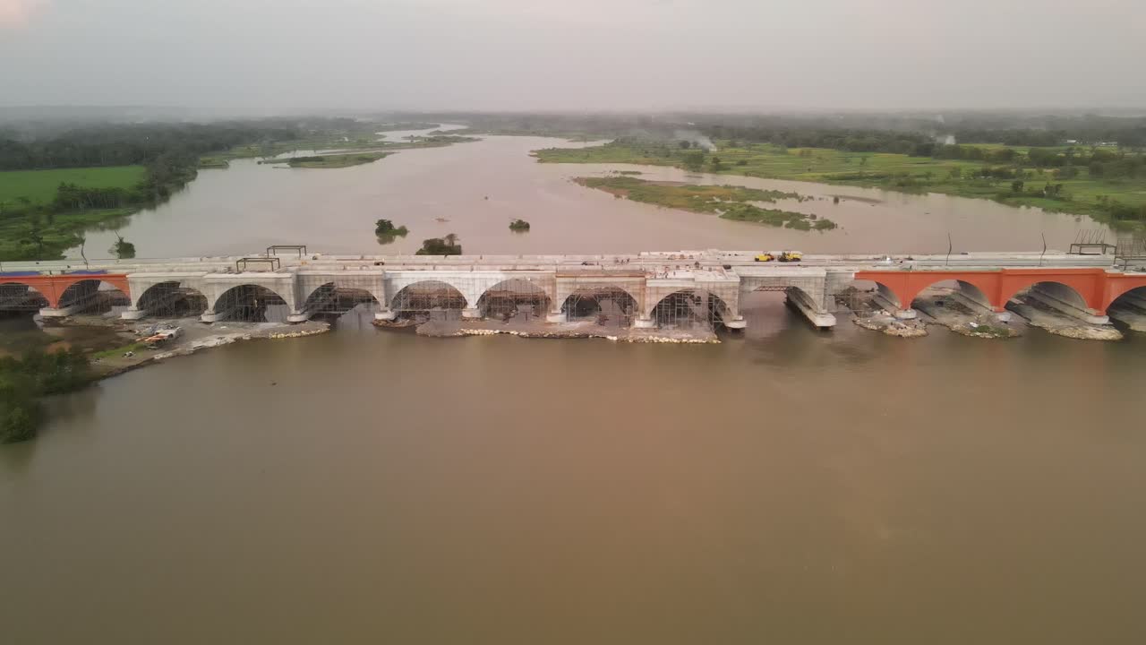 Aerial view of Pandansimo Bridge in Yogyakarta, the southern Java cross bridge is under construction. Adjacent to Baru Beach.