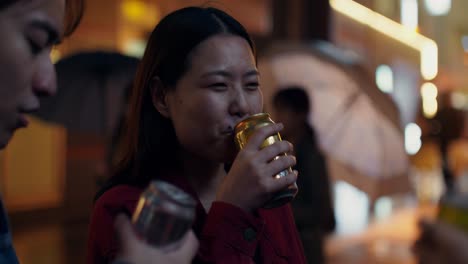 friends enjoying drinks at night