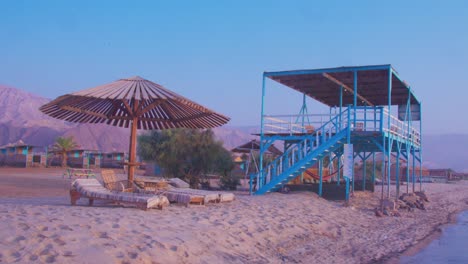 beach guard wood tower and umbrella