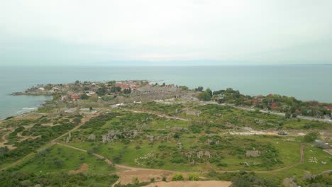Aerial-View-Of-Resort-Town-And-Ruins-Of-The-Ancient-City-In-Side,-Antalya-Province,-‎Turkey