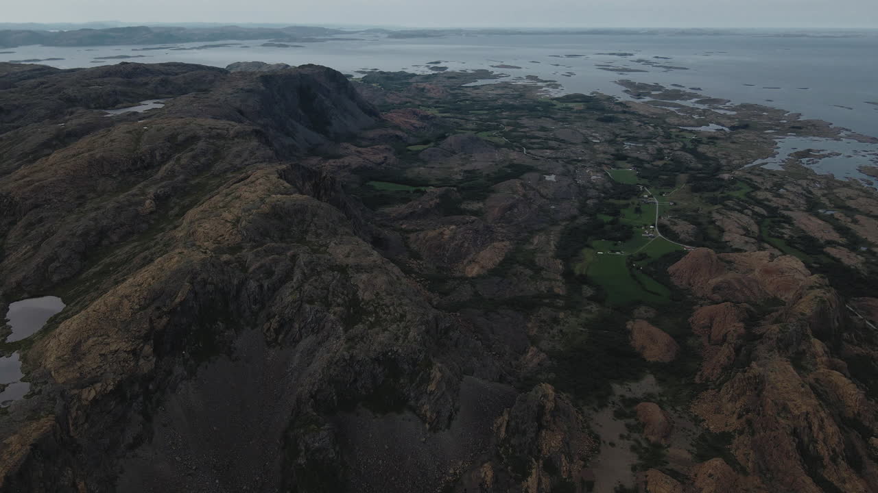 Rocky Summit Of The Mountains In Leka Island Norway in Europe - aerial shot