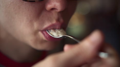 caucasian woman eats traditional sicilian breakfast granita, close up slow motion