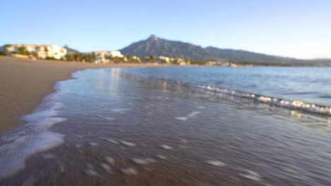 serene beach landscape with mountain view