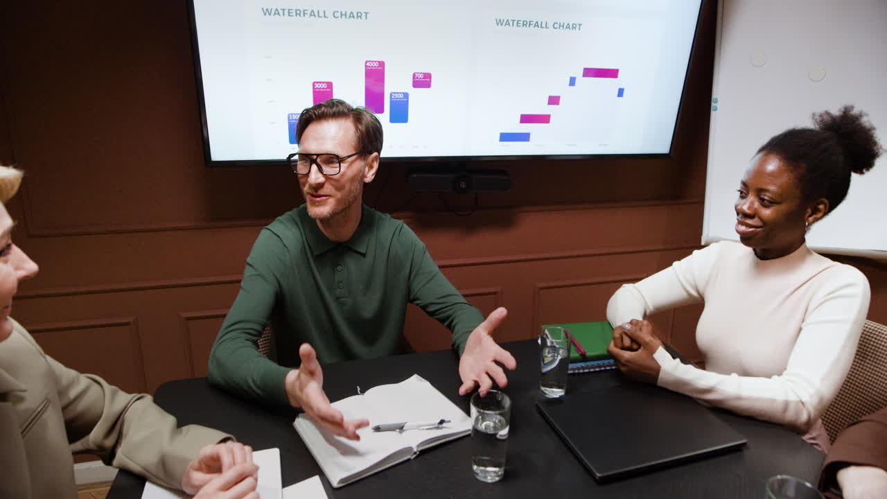 Professionals Discussing Data in a Business Meeting