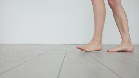 legs and feet on wood flooring