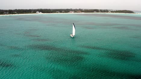 yachting on turquoise ocean into the islands of bahamas in florida