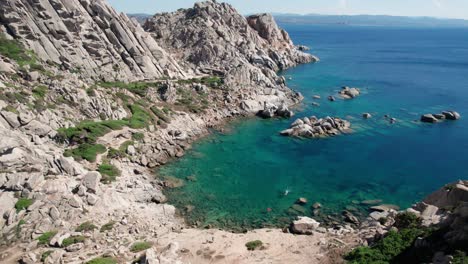 aerial backward view over sea landscape and white rocks