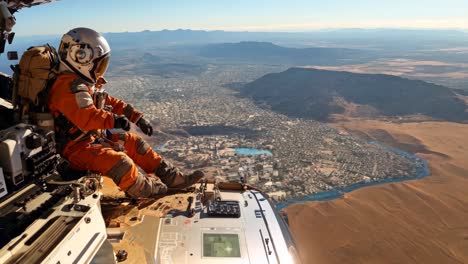 astronaut in orange suit surveys martian-like landscape