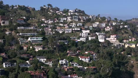 aerial view of hollywood hills west above sunset blvd, high end luxury homes, los angeles