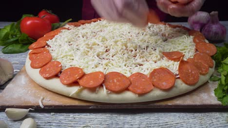 making a pepperoni pizza