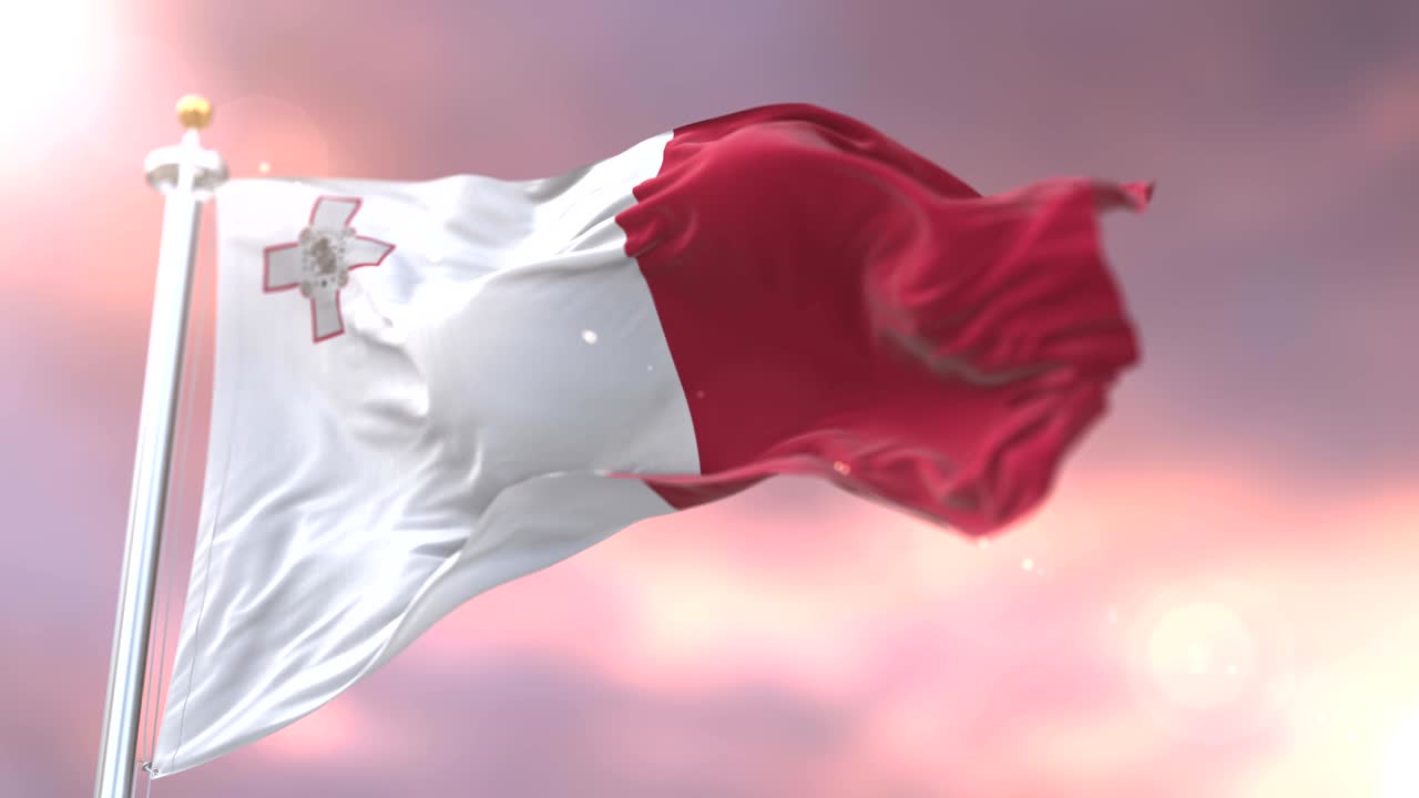 Flag of Malta waving at wind at sunset in slow, loop